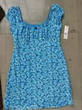 Front view of women elegant French vintage V-neck floral midi dress with high waist