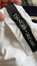 Close-up of the premium elastic waistband durable stitching and contrast panels on boys shorts