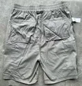 Close-up of the premium elastic waistband durable stitching and contrast panels on boys shorts
