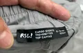 Original factory clearance brand labels and tags attached to brand new pristine kids clothing