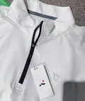 Close-up of quarter-zip collar on men's cycling jersey