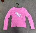 Girls' pink cotton blend long sleeve top in bulk wholesale overstock stock for kidswear resellers