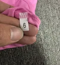 Girls' pink cotton blend long sleeve top in bulk wholesale overstock stock for kidswear resellers