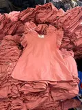 Bulk inventory of girls dusty rose sleeveless tops with eyelet trim for wholesale distribution
