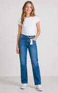 Front view of girls slim straight denim jeans in medium wash blue showing real retail tags as seen