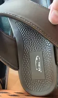 Close-up of men's brown Arabic sandal cushioned footbed and anti-slip sole