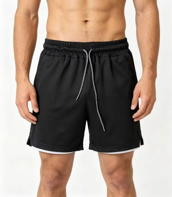 Black athletic shorts showing two-tone layered construction with white inner liner for mesh shorts mens wholesale