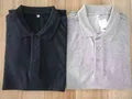 Close-up of care label showing 65% cotton 35% polyester composition on men's polo shirt for wholesale lot