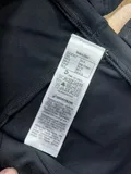 Washing instructions and fabric care label on men quick-dry beachwear