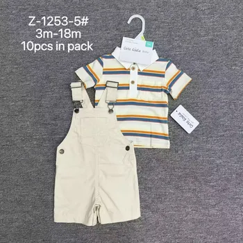 Original factory clearance brand tags and hangers attached to brand new pristine infant clothing