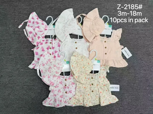 Assorted patterns display of infant muslin clothing sets packed 10pcs per pack for boutique wholesale liquidation