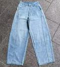 Front flat lay of women's non-stretch curved wide-leg denim jeans for wholesale buyers
