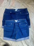 Comparison showcase of two wash options including medium denim blue and dark indigo blue stretch shorts