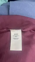 Care label showing 95% rayon 5% spandex composition for women's fold over skirt wholesale lot