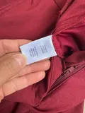 Fabric care and washing instructions label on ladies formal tailored pants