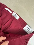 Original factory brand tag attached to the brand new women slouchy trousers
